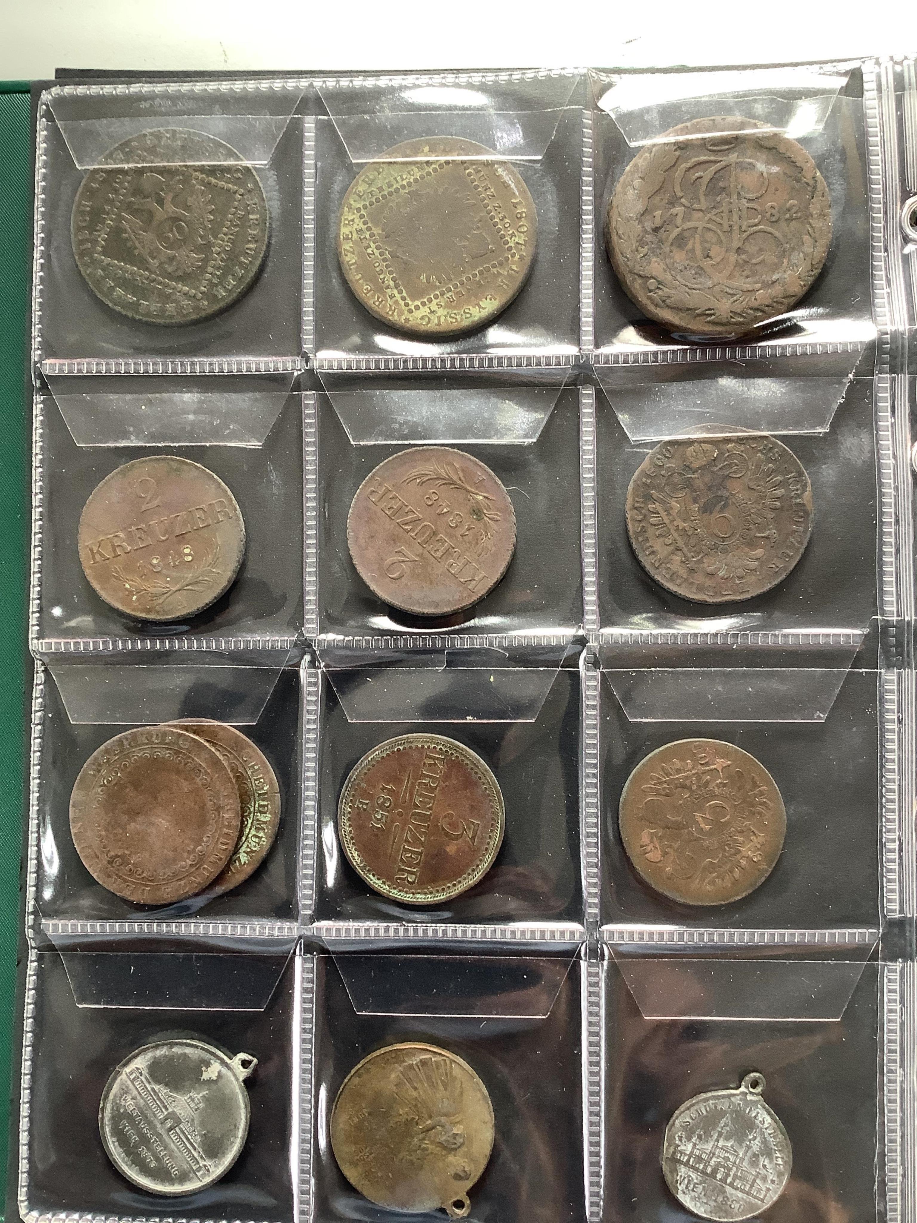 German, Austrian and World coins, in 3 albums, highlights include-, Austria, 17th-20th century; Maria Theresa half Thaler 1759, cleaned otherwise VF, various 1920s-1930s commemorative two shillings, VF or better, France,